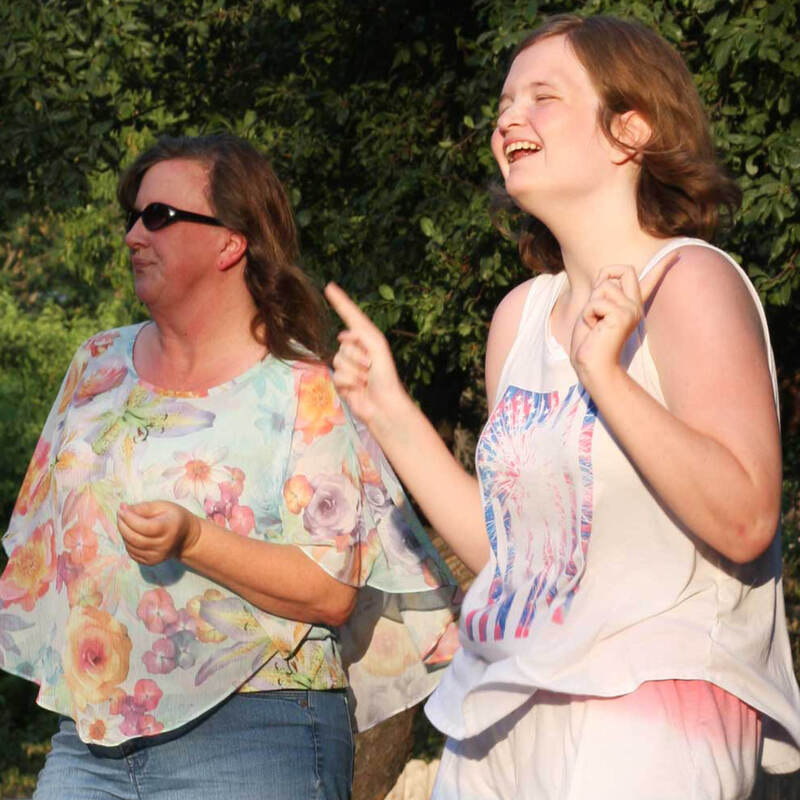 Women dancing at Music in the Parks in Calaveras County